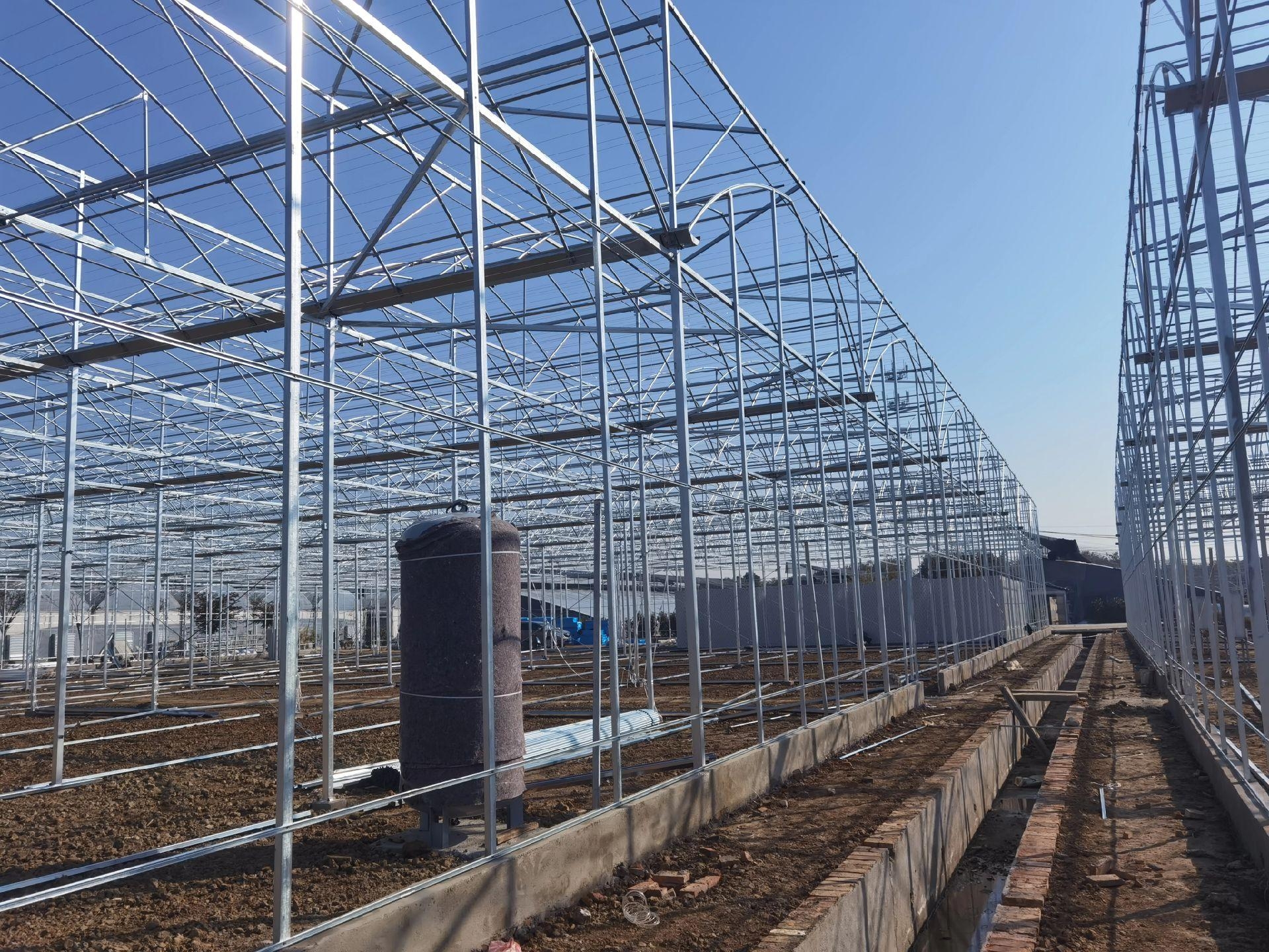 Greenhouse exterior with mesh and ventilation